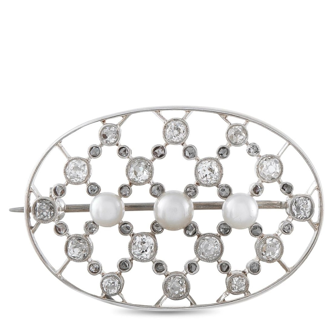14K WHITE GOLD 1.30CT DIAMOND AND PEARL OVAL OPENWORK BROOCH: An exceptional estate piece in 14K white gold, this Edwardian-inspired oval openwork brooch showcases 1.30 carats total weight of old mine cut and rose-cut diamonds set throughout an elegant lattice f