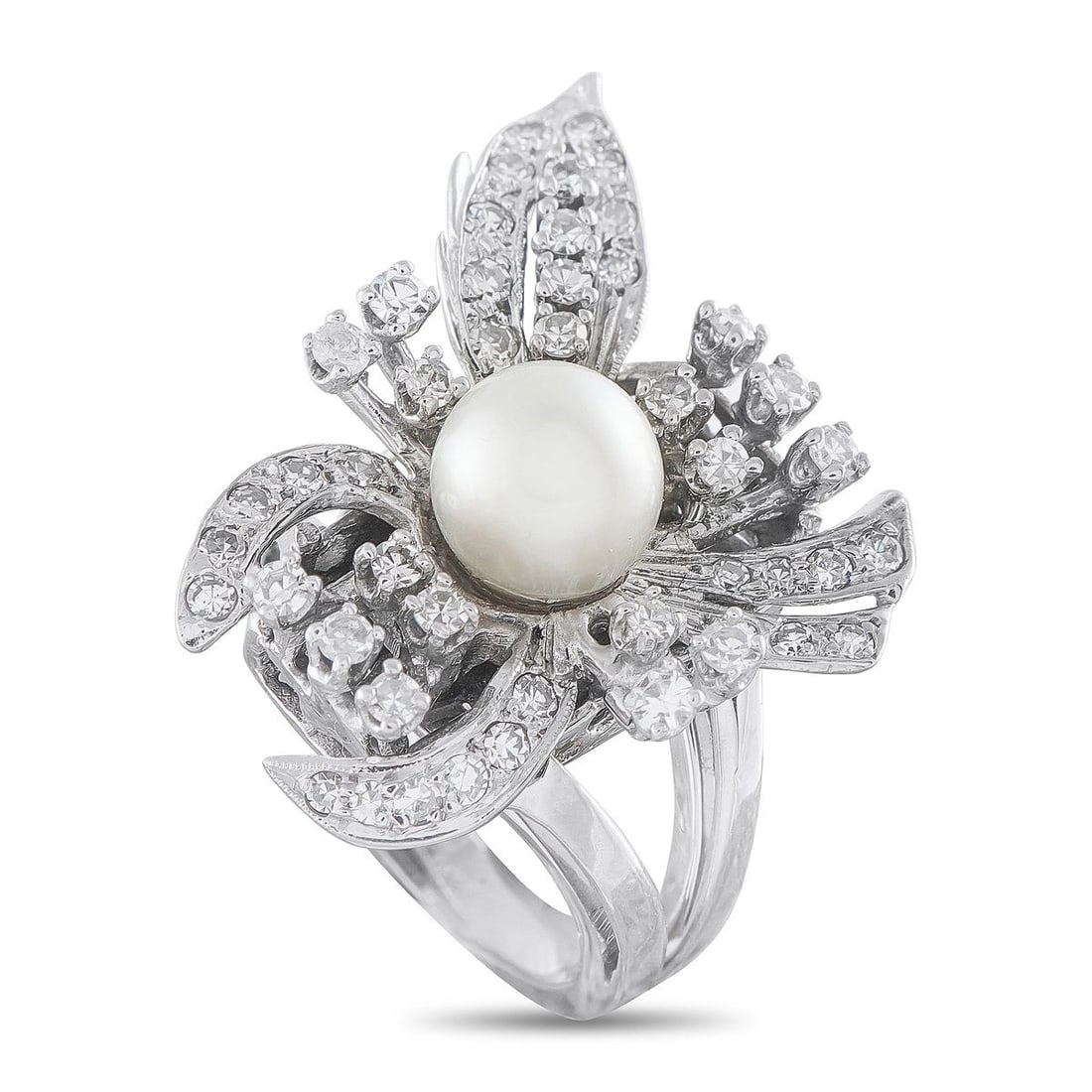 VINTAGE 14K WHITE GOLD 1.0CT DIAMOND AND PEARL FLORAL COCKTAIL RING: A breathtaking vintage 14-karat white gold cocktail ring featuring a lustrous cultured pearl measuring 7.4mm at the heart of an elaborate floral and foliate composition. Approximately 1.00 carat total
