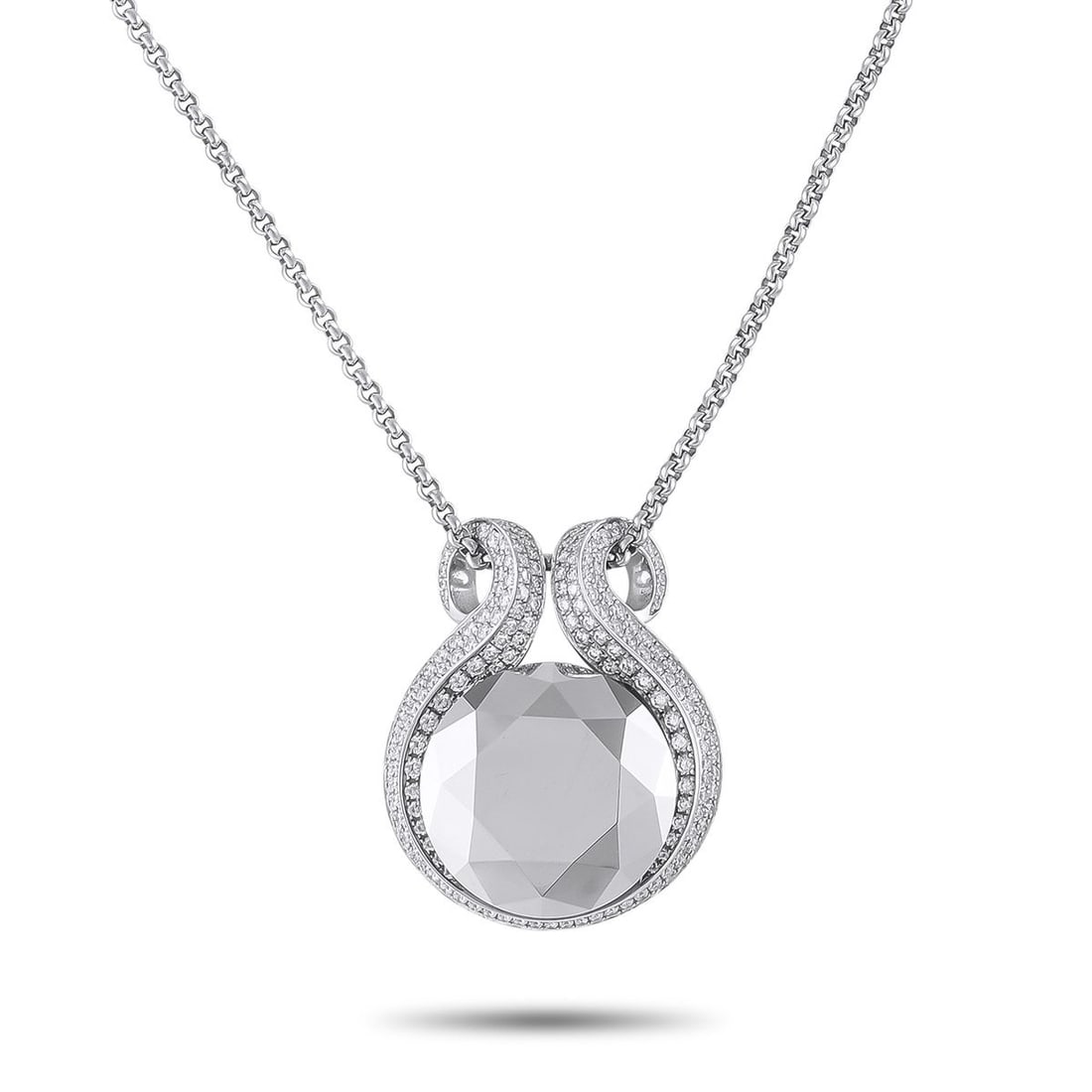 CHOPARD 18K WHITE GOLD DIAMOND AND HEMATITE NECKLACE: This Chopard necklace is undeniably breathtaking. At the center of the 18K White Gold pendant, a bold Hematite center stone instantly draws the eye. Inset Diamonds add even more opulence to this uniqu
