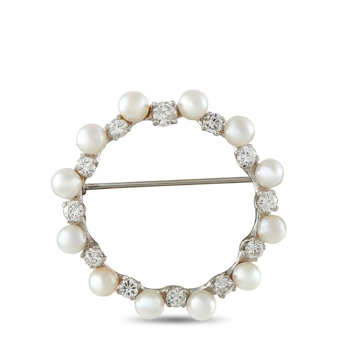 14K WHITE GOLD 1.30CT DIAMOND AND PEARL BROOCH: This brooch is crafted in 14K white gold in an open circle design, alternating cultured pearls with round brilliant diamonds totaling approximately 1.30 carats. The brooch measures approximately 1.38 