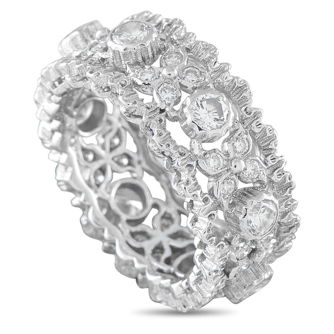 BUCCELLATI VINTAGE 18K WHITE GOLD 1.12CT DIAMOND RING: This Buccellati ring is crafted in 18K white gold, showcasing the maison's signature intricate rigato engraving throughout an openwork lattice gallery. It is set with round brilliant diamonds totaling