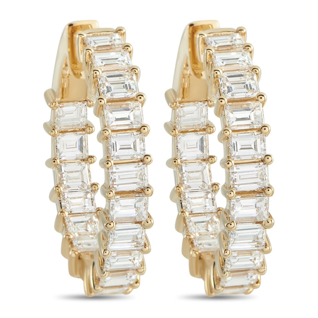 18K YELLOW GOLD 5.0CT DIAMOND INSIDE-OUT HOOP EARRINGS: In 18k yellow gold, these 1.0-inch hoops are fully encircled with baguette diamonds set east-west in shared prongs. The step-cut diamonds cover the front exterior and inner-facing edge of the hoop, fo
