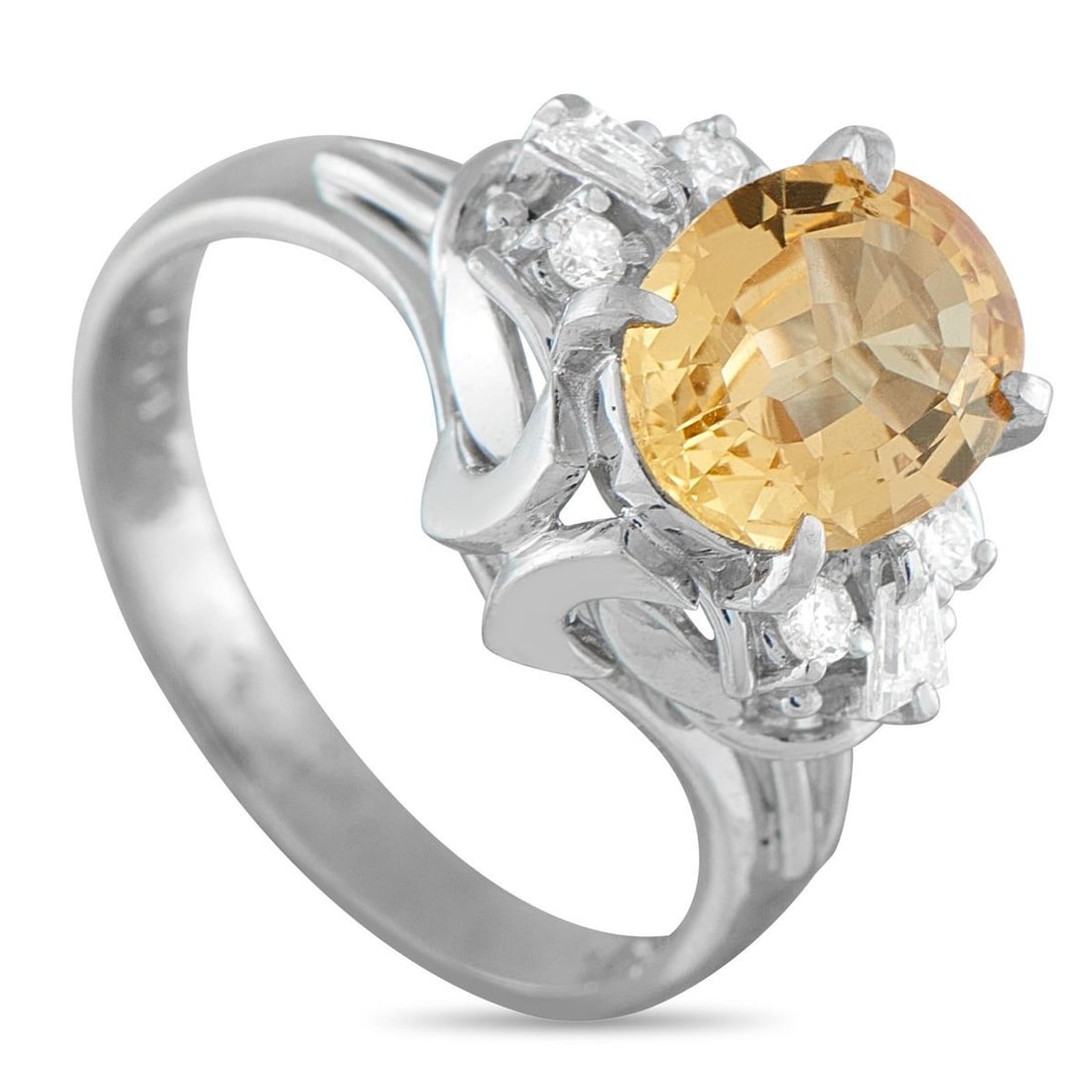 PLATINUM 0.16CT DIAMOND AND IMPERIAL TOPAZ RING: A breathtaking 1.67 carat Imperial Topaz center stone is beautifully showcased by an ornate Platinum setting on this luxury ring. Incredibly chic, Diamond accents totaling 0.16 carats elevate the clas