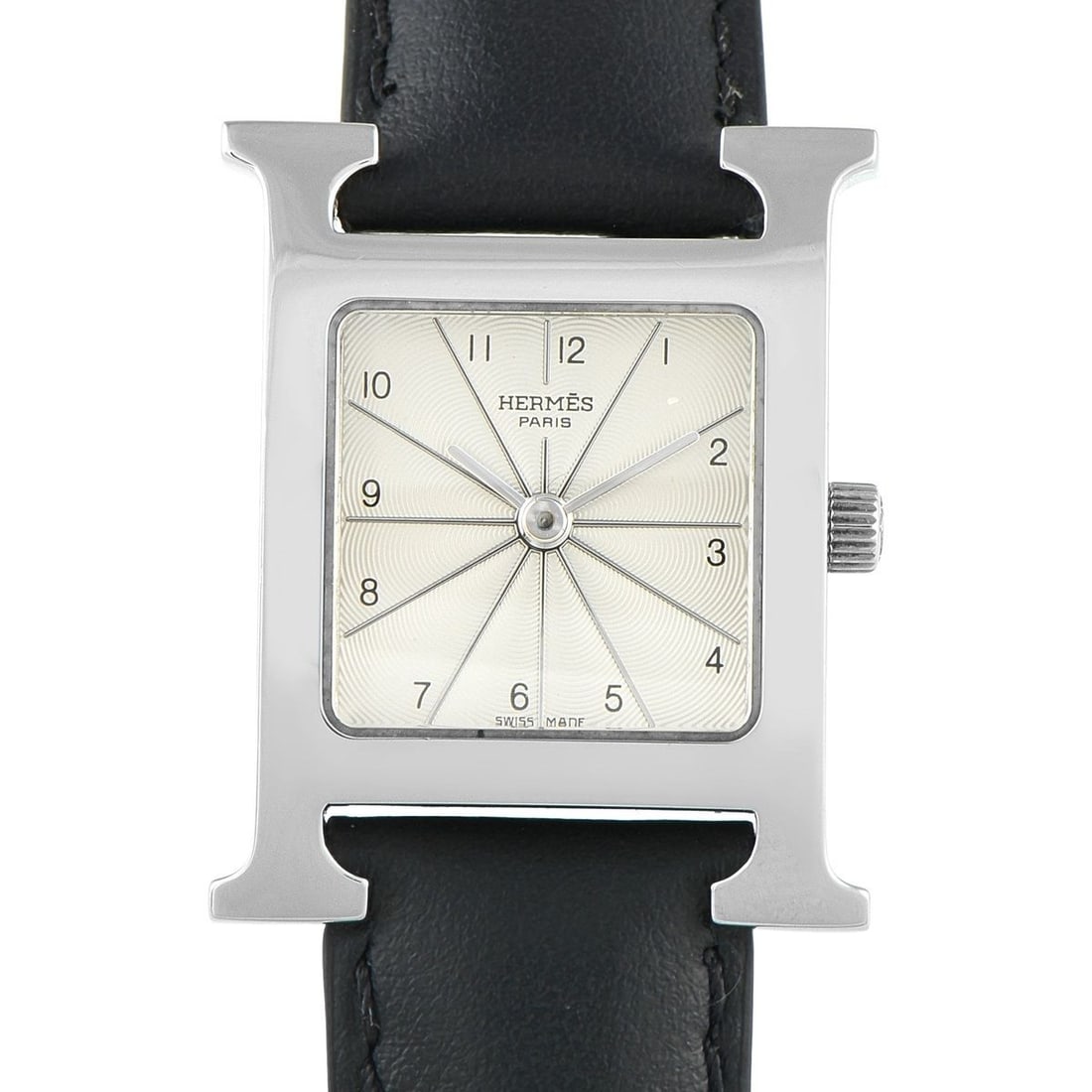 HERMES HEURE H STEEL QUARTZ WATCH: In this particular Herms Heure ref. HH1.201 watch, the iconic H-shaped case is paired with a white dial detailed with baton hands and fine radiating lines. Thin yet crisp Arabic numeral hour markers i
