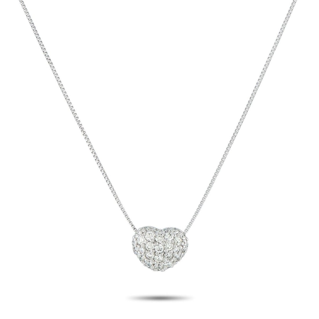 18K WHITE GOLD 1.0CT DIAMOND PAVE HEART NECKLACE: An piece that captures a lifetime of light and love. It features a box chain holding a heart pendant blanketed in 1.0 carat of brilliant pav diamonds. The petite stones create a seamless sheet of spar