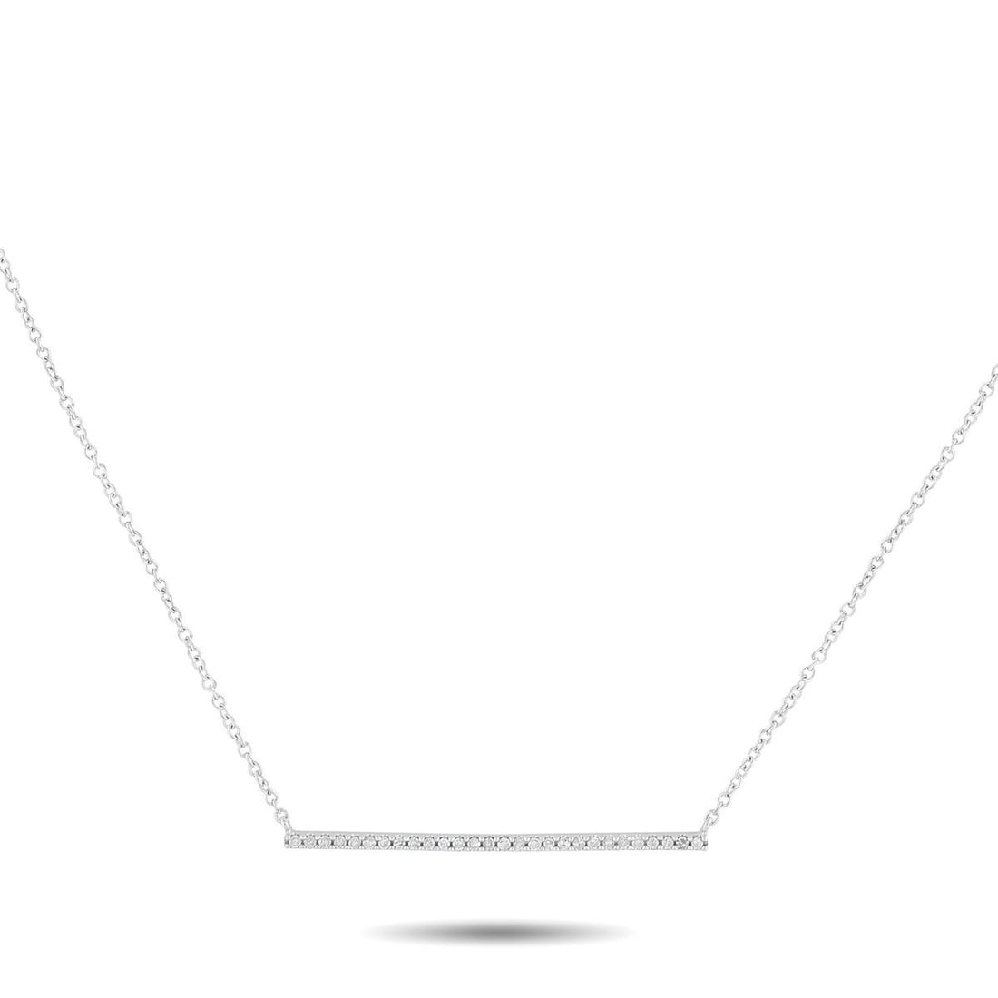 14K WHITE GOLD 0.10CT DIAMOND NECKLACE: This sleek, sophisticated necklace is the perfect way to add a touch of luxury to any outfit or occasion. The understated design features a series of Diamonds totaling 0.10 carats accenting a slender 