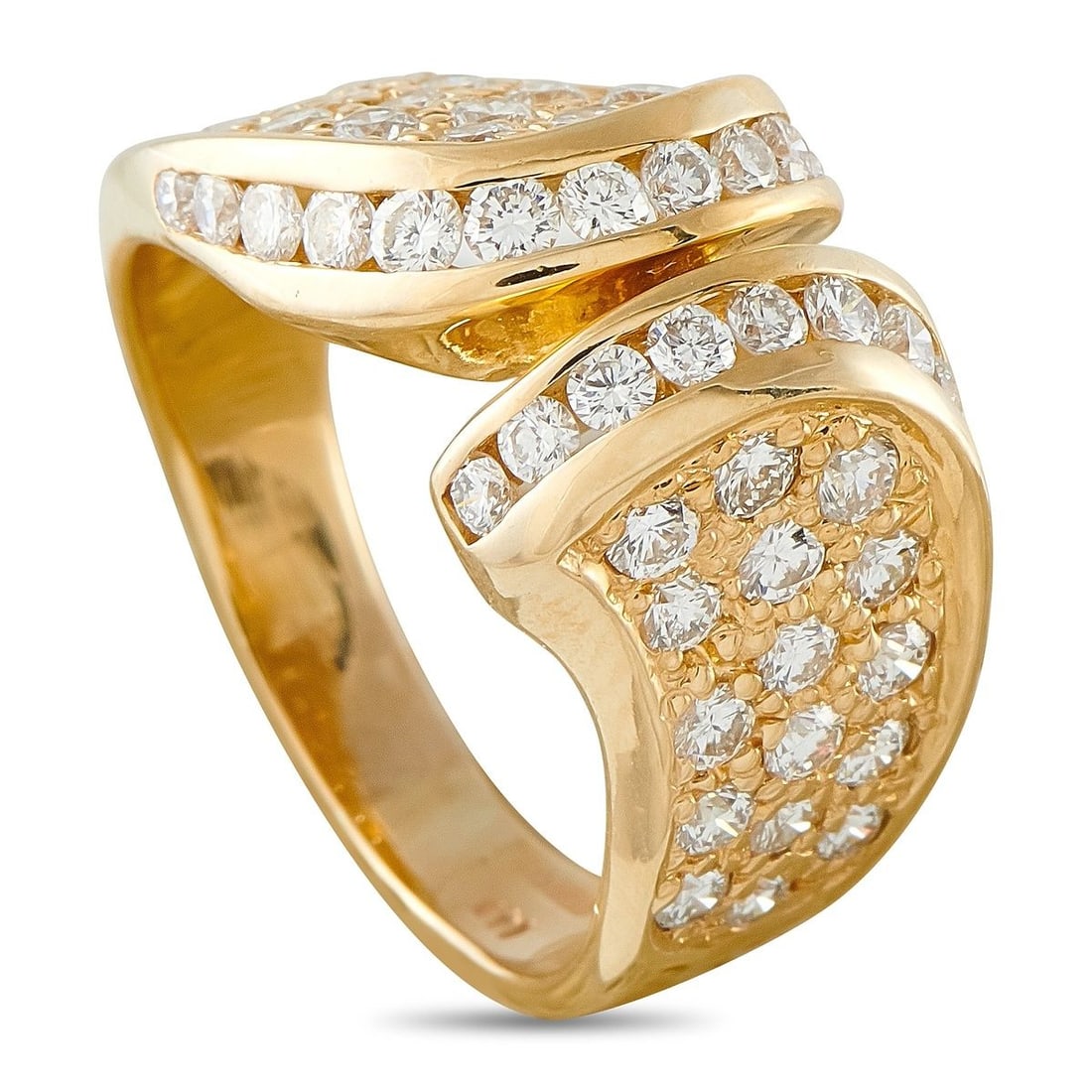 14K YELLOW GOLD 1.25CT DIAMOND RING: A striking bypass ring in 14K yellow gold, featuring two diamond discs in an interlocking crossover design with round brilliant diamonds totaling 1.25 carats. Channel-set diamond rows accent the shoul