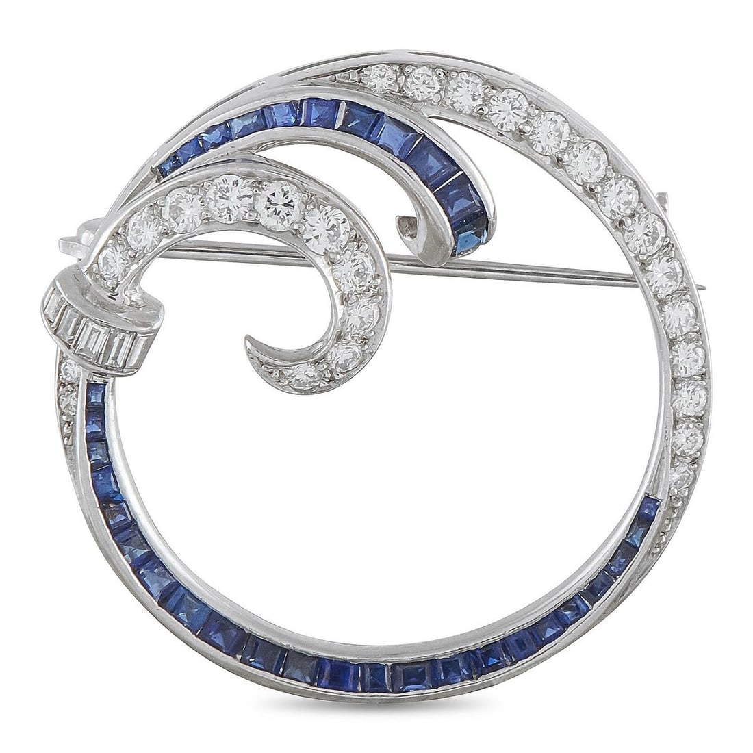 VINTAGE PLATINUM 1.0CT DIAMOND AND SAPPHIRE BROOCH: This vintage brooch is filled with delicate details. Set in Platinum, a ribbon-like design adds a sense of fluidity to the simple, circular setting. Diamonds with a total weight of 1.0 carats are beau