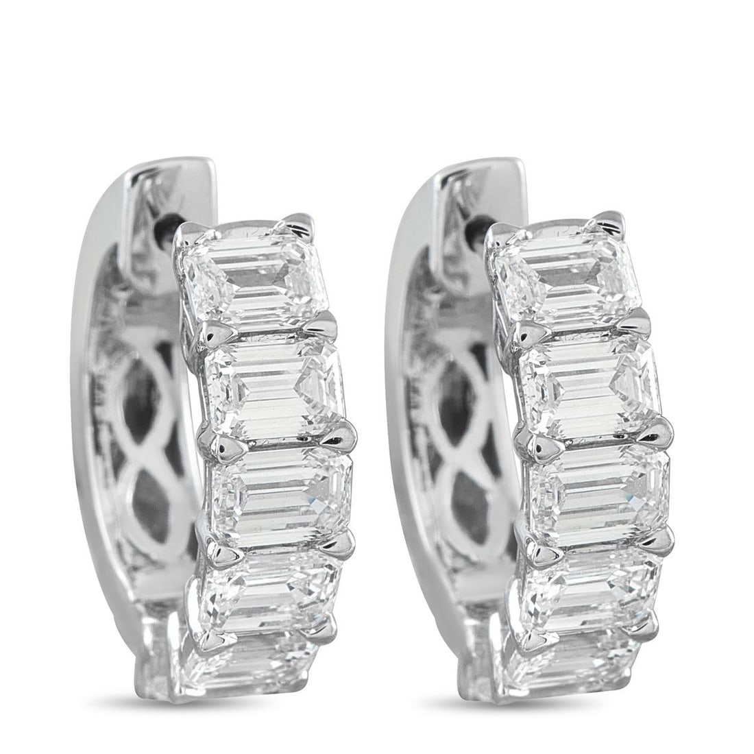18K WHITE GOLD 3.01CT DIAMOND HOOP EARRINGS: Diamonds with a total weight of 3.01 carats make these earrings an elegant addition to any ensemble. Set in 18K White Gold, each earring measures 0.63 round.This jewelry piece is offered in brand new 