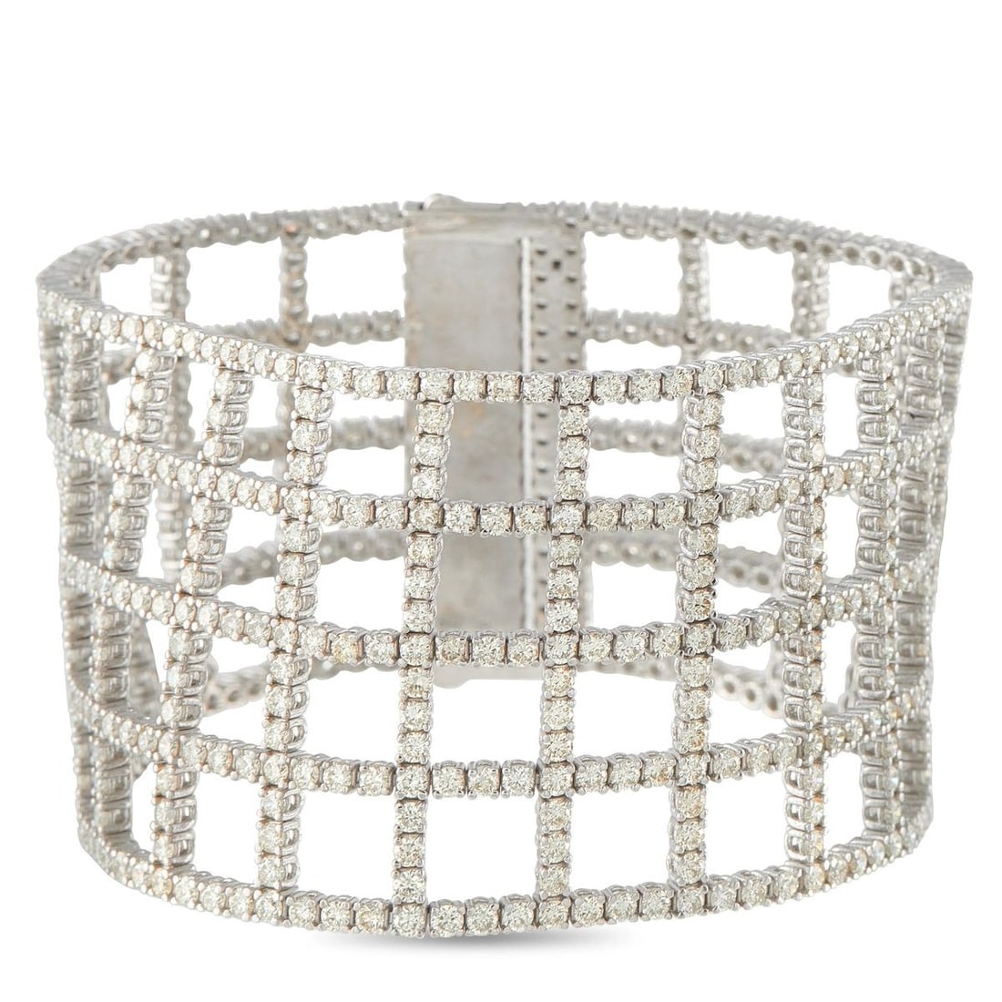 18K WHITE GOLD 23.44CT FANCY YELLOW DIAMOND BRACELET: A delicate lattice pattern makes this luxury bracelet incredibly unique. Set in 18K White Gold, Diamonds with a total weight of 23.44 carats offer endless sparkle. This dramatic piece measures 7.0 lon