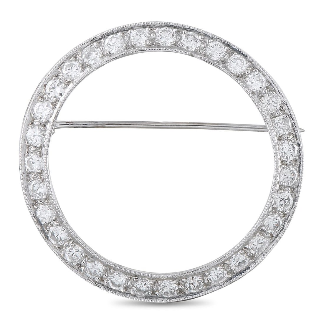 PLATINUM 1.50CT DIAMOND CIRCULAR BROOCH: This brooch is stunning in its simplicity. The circular Platinum setting effortlessly catches the light thanks to sparkling diamonds with a total weight of 1.50 carats. It measures 1.25 round and weig