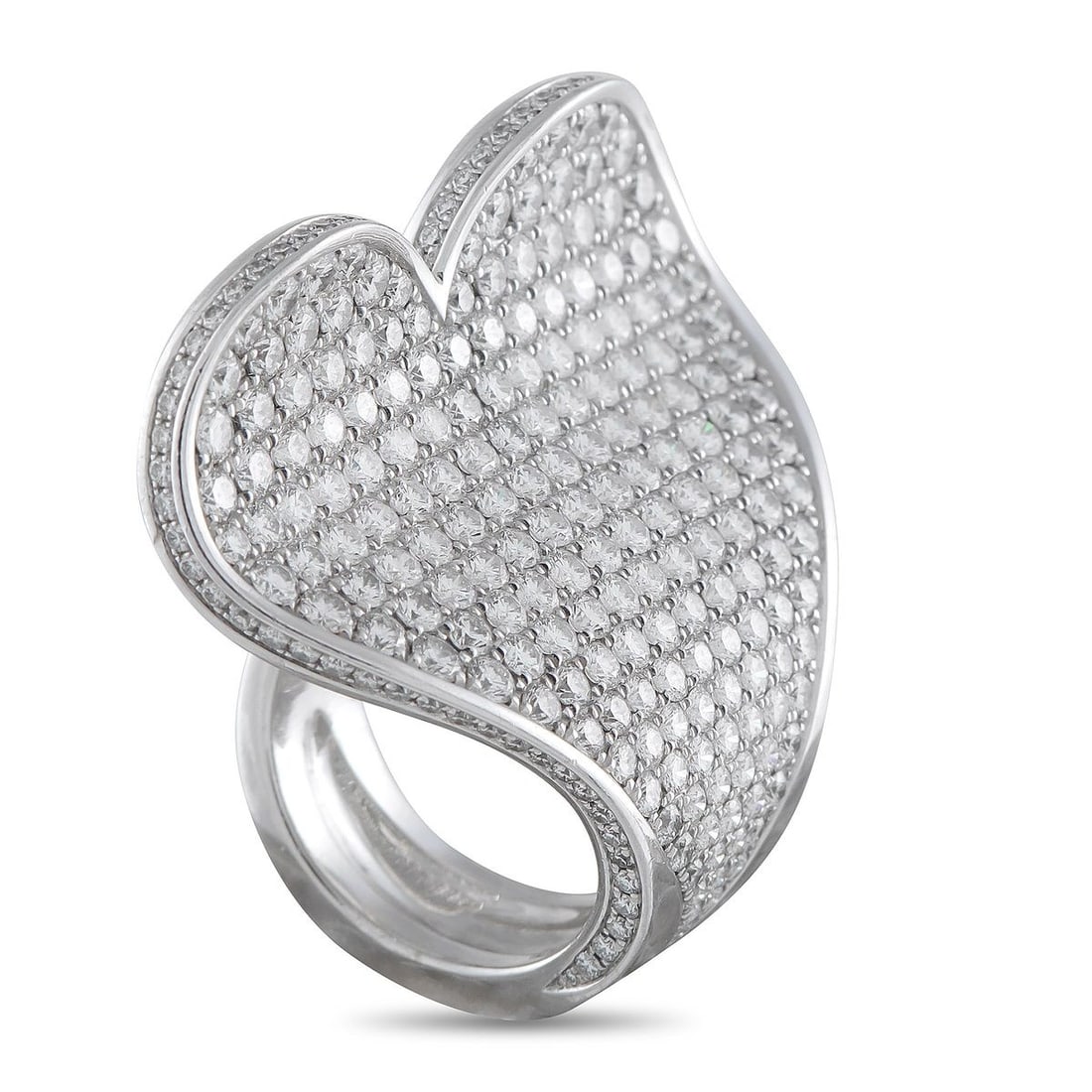 ROGER DUBUIS 18K WHITE GOLD 7.5CT DIAMOND HEART STATEMENT RING: Bold in scale, this Roger Dubuis creation stands out without feeling rigid. It is crafted in white gold and features a continuous form, with the polished band flowing directly into a semi-flat heart c