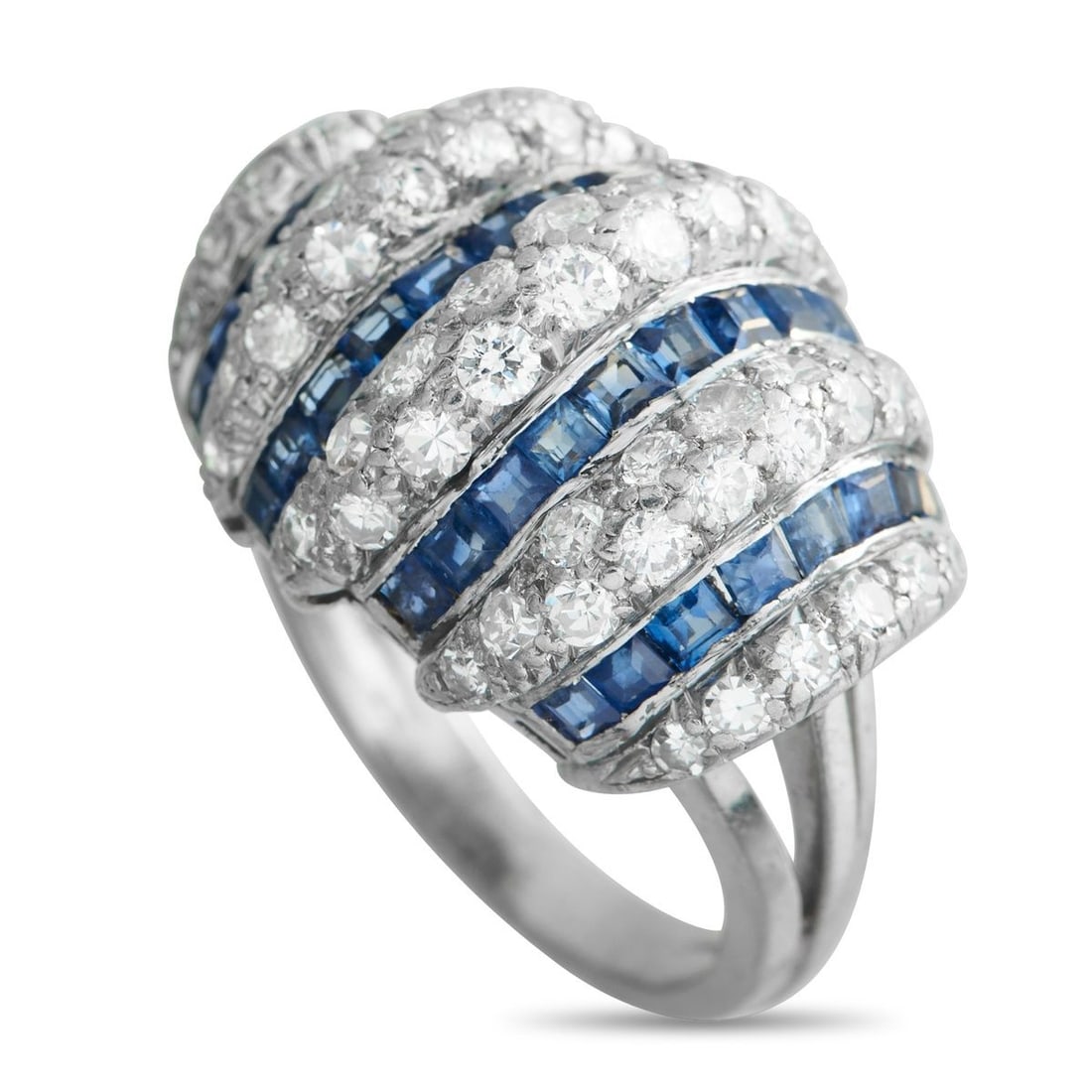 PLATINUM 0.84CT DIAMOND AND SAPPHIRE RING: This luxury ring is bold and incredibly impressive. At the top of the design, Diamonds with a total weight of 0.84 carats alternate with Sapphire gemstones totaling 2.20 carats. Set in Platinum, it fe