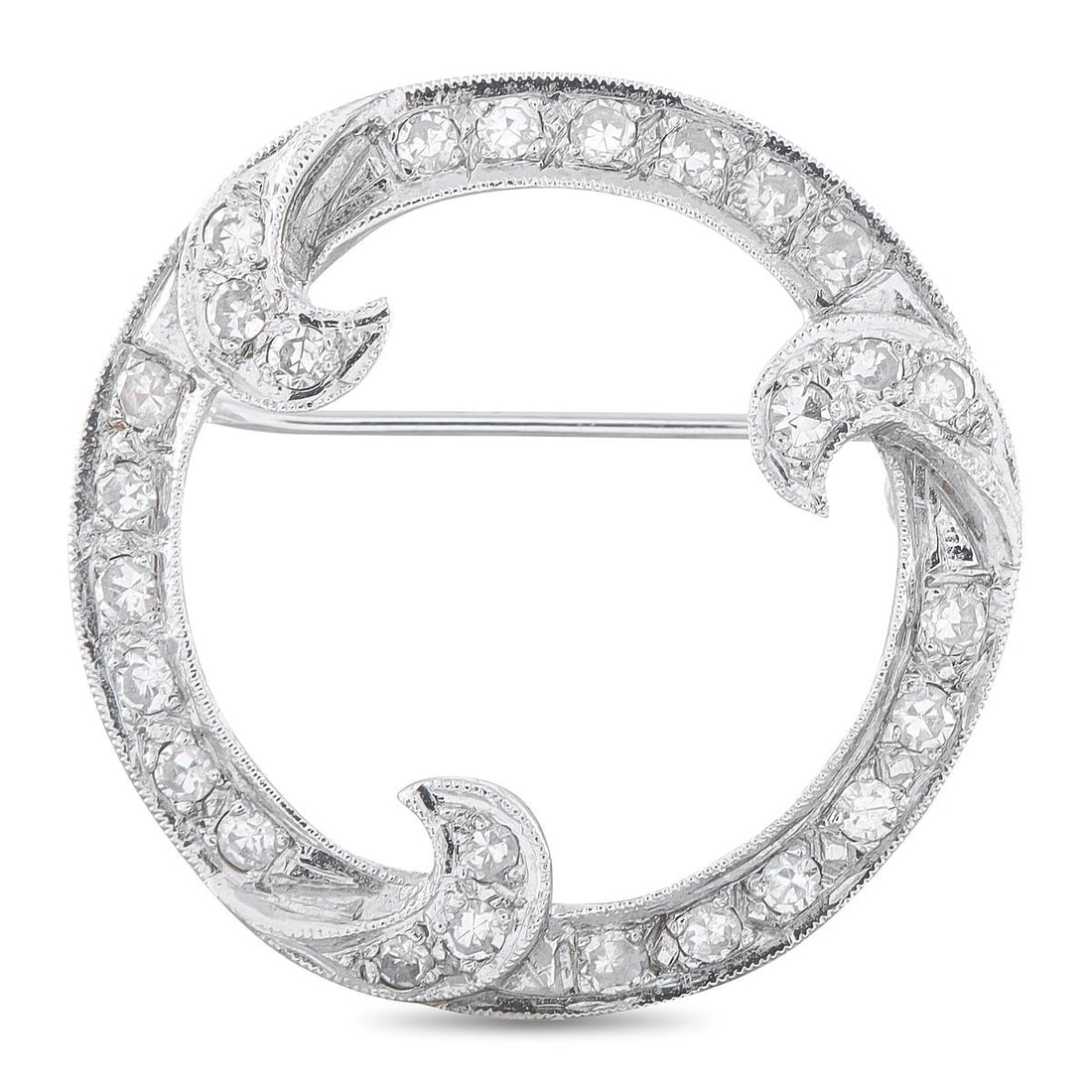 14K WHITE GOLD 0.60CT DIAMOND BROOCH OPEN CIRCLE BROOCH: A graceful estate brooch in 14K white gold, this open circle design is set throughout with 0.60 carats total weight of round brilliant diamonds, accented by delicate scrolled foliate flourishes at the