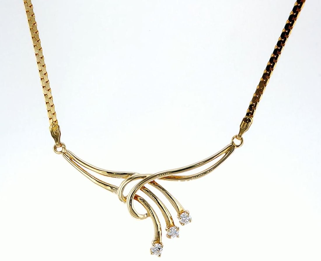14kt Yellow Gold 0.26ctw Diamond Pendant: One 14k yellow gold pendant with chain (14k stamped), set with natural diamonds. Jewelry Weight: 7.81Grs Total Diamonds Weight: 0.26Cts Main Stones Description: Quantity: 3 Cut and shape: Round Brilli
