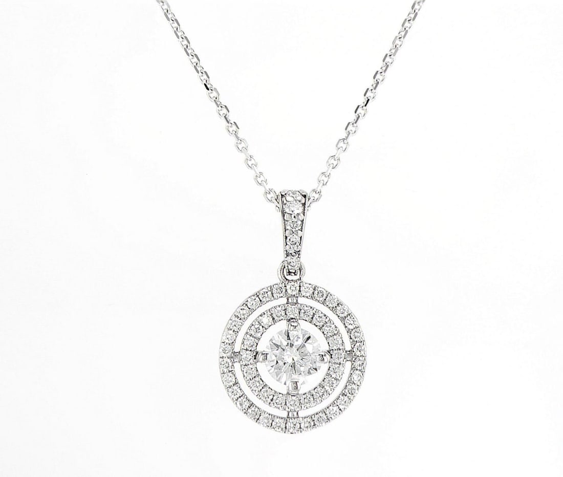 14K White Gold 0.68ctw Pendant: Jewelry Description Description: Lab Grown Diamond Pendant, 14K White Gold Jewelry Weight: 2.97 Grs Total Diamonds Weight: 0.68 Cts Precious Metal: 14K White Gold Certificate Number: DSL- 4450141221 A