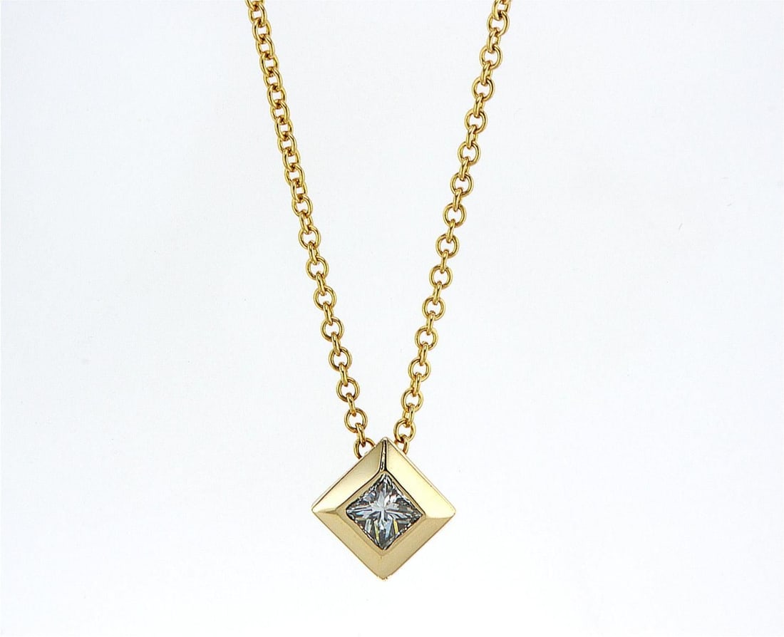 14kt Yellow Gold 0.45ctw Diamond Pendant: One 14k yellow gold pendant with chain (14k stamped), set with one center natural diamond. Jewelry Weight: 4.1Grs Total Diamonds Weight: 0.45Cts Main Stones Description: Quantity: 1 Cut and shape: Pri