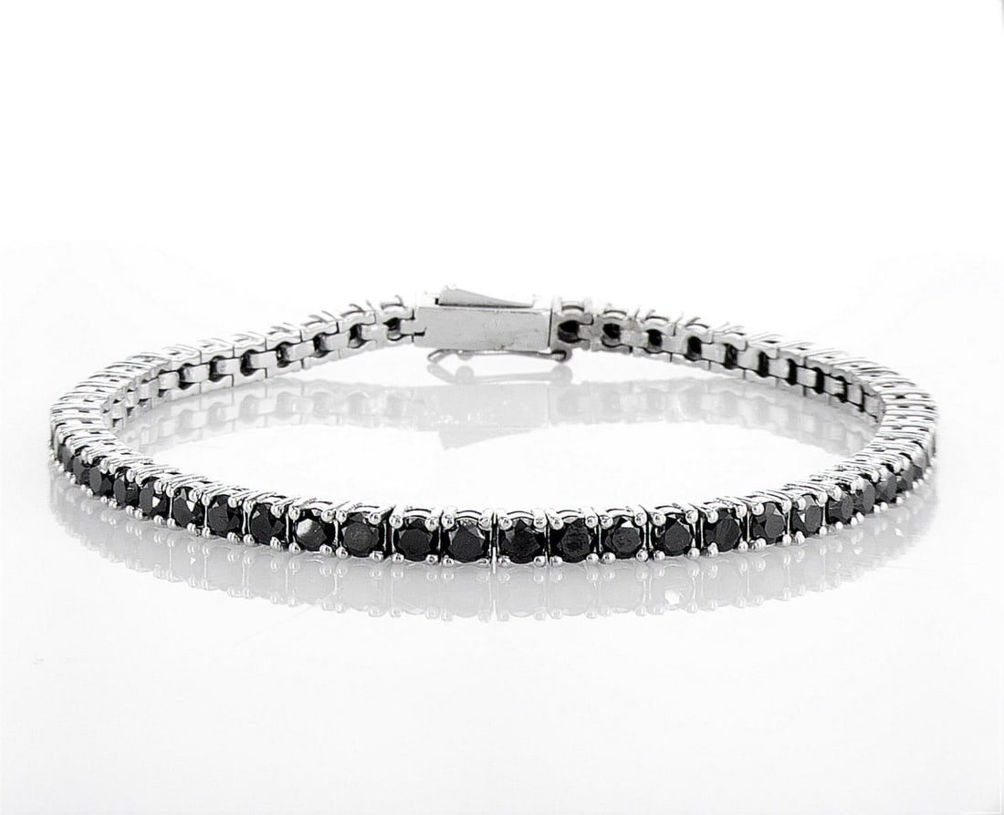 14kt White Gold 6.38ctw Diamond Bracelet: Jewelry Description Description: One 14k white gold bracelet, set with natural diamonds. Jewelry Weight: 12.62 Grs Total Diamonds Weight: 6.38 Cts Precious Metal: 14kt White Gold Certificate Number: D