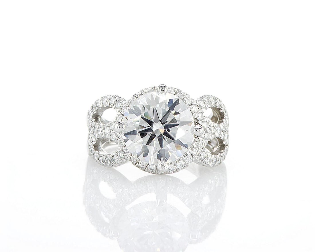 14kt White Gold 5.65ctw Diamond Ring: Jewelry Description Description: One 14k white gold ring, set with lab grown diamonds. Jewelry Weight: 8.77 Grs Total Diamonds Weight: 5.65 Cts Precious Metal: 14kt White Gold Certificate Number: DSL-