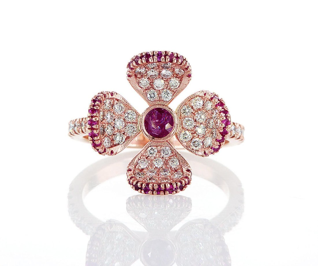 14kt Rose Gold 0.6ctw Diamond Ring: Jewelry Description Description: One 14k rose gold ring, set with natural ruby and natural diamonds. Jewelry Weight: 5.07 Grs Total Diamonds Weight: 0.6 Cts Precious Metal: 14kt Rose Gold Certificate 