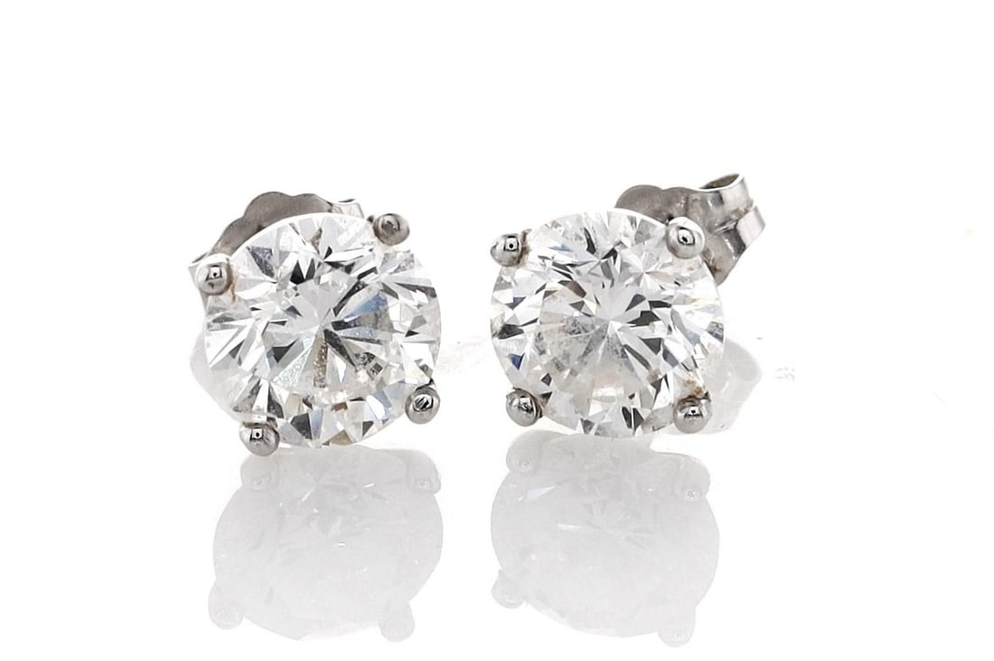 14kt White Gold 3.08ctw Diamond Earrings: Jewelry Description Description: One 14k white gold earrings, set with lab grown diamonds. Jewelry Weight: 1.38 Grs Total Diamonds Weight: 3.08 Cts Precious Metal: 14kt White Gold Certificate Number: 