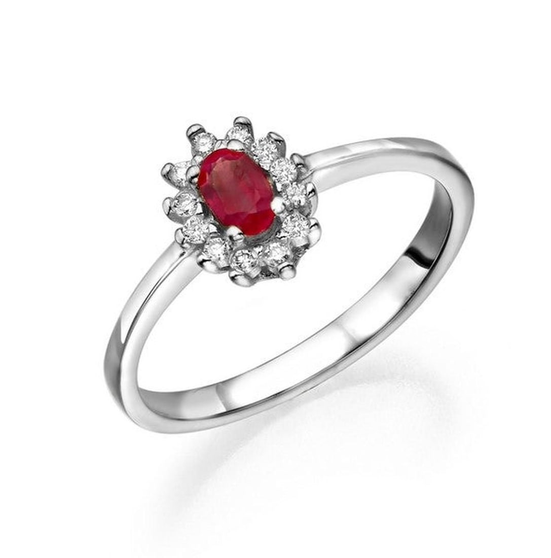 14kt White Gold 0.35ctw Diamond Ring: One 14k white gold ring, set with natural diamond. Jewelry Weight: 2.2Grs Total Diamonds Weight: 0.35Cts Main Stones Description: Quantity: 1 Cut and shape: Oval Carats Weight: 0.35 Color: Ruby Side S