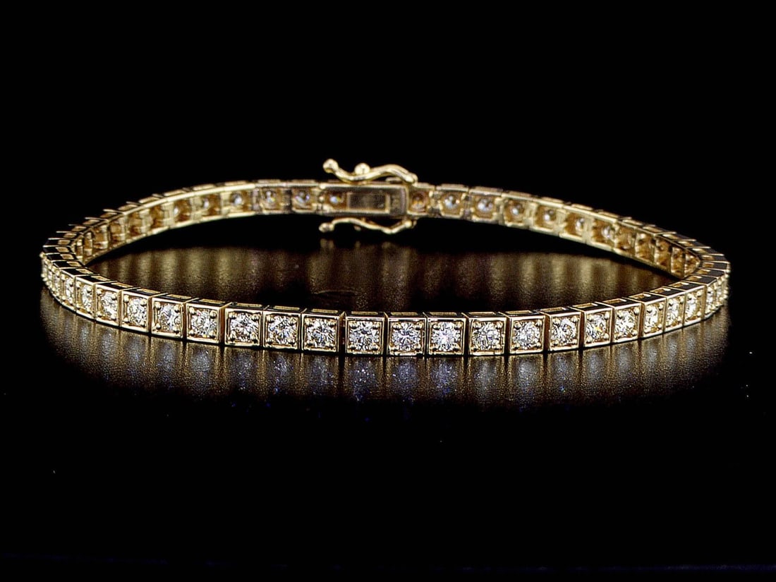 14kt Yellow Gold 3.53ctw Diamond Tennis Bracelet: One 14k yellow gold bracelet "tennis" (14k stamped) set with natural Diamonds. Natural diamonds description: Cut and shape: Round Brilliant. Total Weight: 3.53 cts. Cut/polish/symmetry: Excellent/Exce