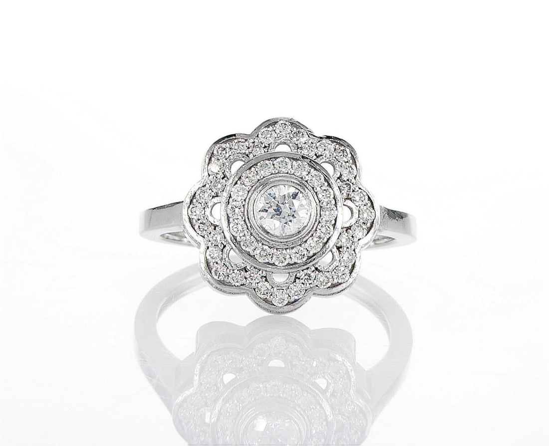 14kt White Gold 0.65ctw Diamond Ring: Jewelry Description Description: One 14k white gold ring, set with natural diamonds. Jewelry Weight: 4.49 Grs Total Diamonds Weight: 0.65 Cts Precious Metal: 14kt White Gold Certificate Number: DSL- 4