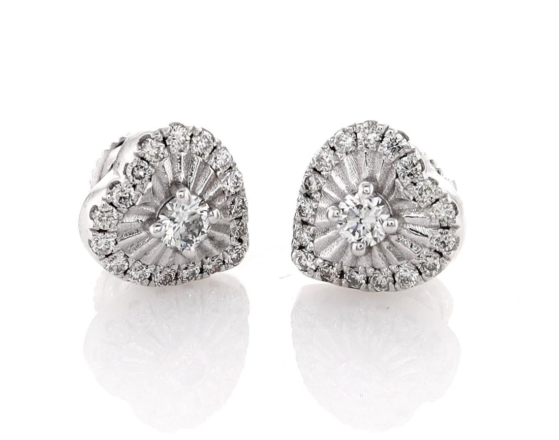 14kt White Gold 0.57ctw Diamond Earrings: Jewelry Description Description: One 14k white gold earrings, set with natural diamonds. Jewelry Weight: 2.34 Grs Total Diamonds Weight: 0.57 Cts Precious Metal: 14kt White Gold Certificate Number: DS