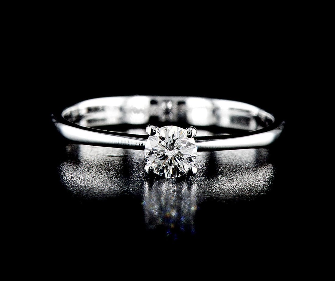 14kt White Gold 0.32ctw Diamond Ring: One 14k white gold ring Jewelry Weight: Grs Total Diamonds Weight: 0.32Cts Main Stones Description: Quantity: 1 Cut and shape: Round Brilliant Carats Weight: 0.32 Clarity: SI1 Color: E Polish/Symmetry