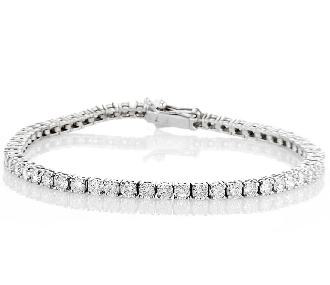 14K White Gold 3.66ctw: Jewelry Description Description: Lab Grown Diamond Earring, 14K White Gold Jewelry Weight: 1.5 Grs Total Diamonds Weight: 3.66 Cts Precious Metal: 14K White Gold Certificate Number: IGI- 722569973 To 