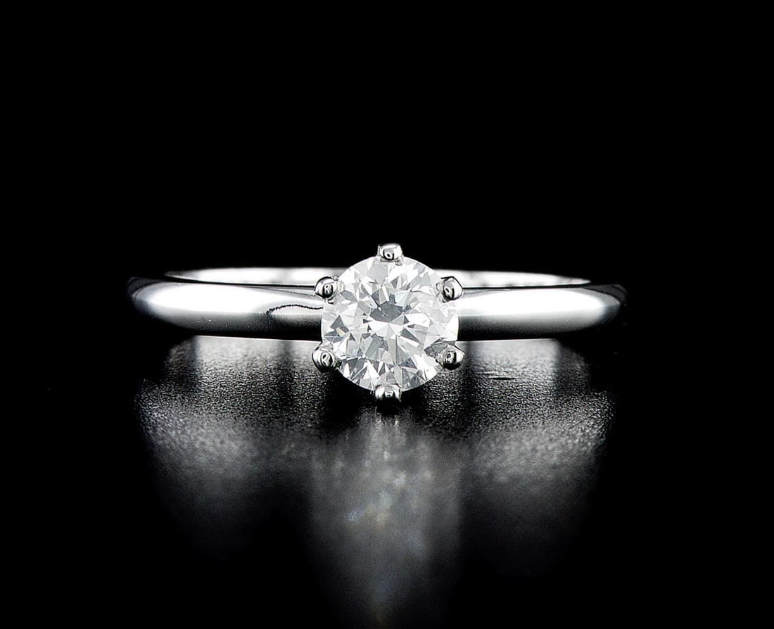 14kt White Gold 0.71ctw Diamond Ring: One 14k white gold ring (14k stamped), set with one center natural diamond. Jewelry Weight: 2.98Grs Total Diamonds Weight: 0.71Cts Main Stones Description: Quantity: 1 Cut and shape: Round Brilliant C