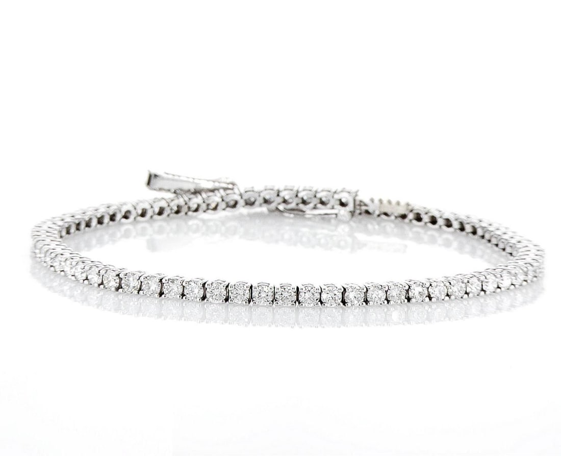 14kt White Gold 2.78ctw Diamond Bracelet: One 14k white gold bracelet "Tennis" (14k stamped), set with natural diamonds. Jewelry Weight: 6.49Grs Total Diamonds Weight: 2.78Cts Main Stones Description: Cut and shape: Round Brilliant Carats Wei