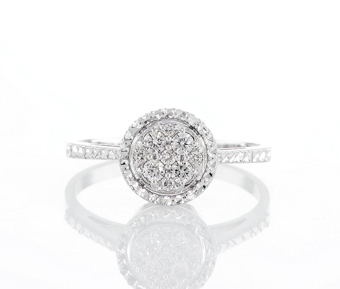 14kt White Gold 0.18ctw Diamond Ring: Jewelry Description Description: One 14k white gold ring, set with natural diamonds. Jewelry Weight: 2.1 Grs Total Diamonds Weight: 0.18 Cts Precious Metal: 14kt White Gold Certificate Number: DSL- 44