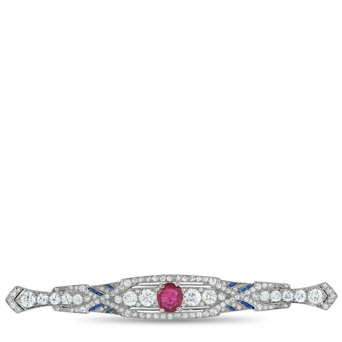 PLATINUM 2.80CT DIAMOND AND NO-HEAT BURMA RUBY BROOCH: A sleek, Art Deco inspired design makes this luxury brooch endlessly impressive. Sparkling Diamonds with a total weight of 2.80 carats allow it to effortlessly catch the light, while a radiant 1.10 ca