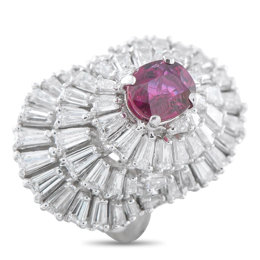 PLATINUM 5.50CT DIAMOND AND RUBY RING: Rows upon rows of sparkling Diamonds with a total weight of 5.50 carats surround a 2.50 carat Ruby center stone on this impressive luxury ring. Set in Platinum, a 2mm wide band and a 17mm top height e