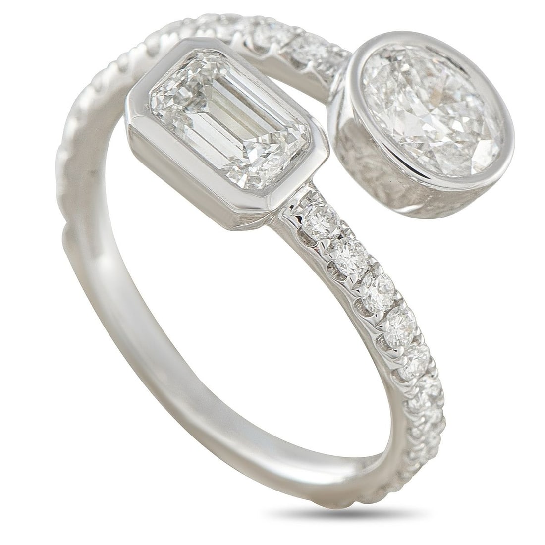 18K WHITE GOLD 1.95CT DIAMOND BYPASS RING: This bypass ring is ideal for anyone who appreciates understated luxury. The charming 18K White Gold setting wraps around the finger and is bookended by sparkling Diamonds totaling 1.50 carats. Additi