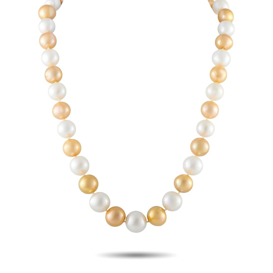 GOLDEN AND WHITE PEARL NECKLACE: This necklace features a strand of alternating white and golden South Sea pearls, with white pearls measuring 11-15mm and golden pearls measuring 12-14mm. It is finished with an ornate gold box clasp 