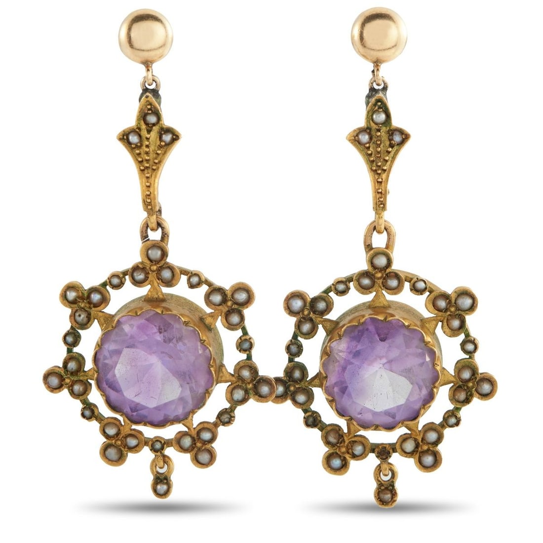 ANTIQUE 18K YELLOW GOLD AMETHYST AND SEED PEARL EARRINGS: These antique earrings are a veritable work of art. Amethyst gemstones make a statement at the center of the delicate 18K Yellow Gold settings. Seed Pearl accents add depth and dimension to the overal