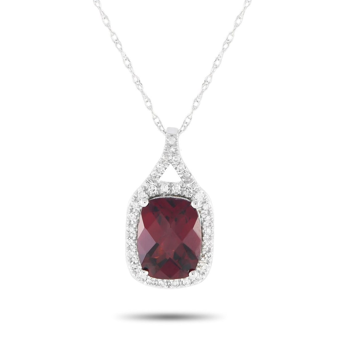 14K WHITE GOLD 0.13CT DIAMOND AND GARNET PENDANT NECKLACE: A captivating Garnet gemstone sits at the center of a pendant measuring 0.75 long by 0.45 wide on this exquisite 14K White Gold necklace. Simple and elegant, its suspended from an 18 chain and include