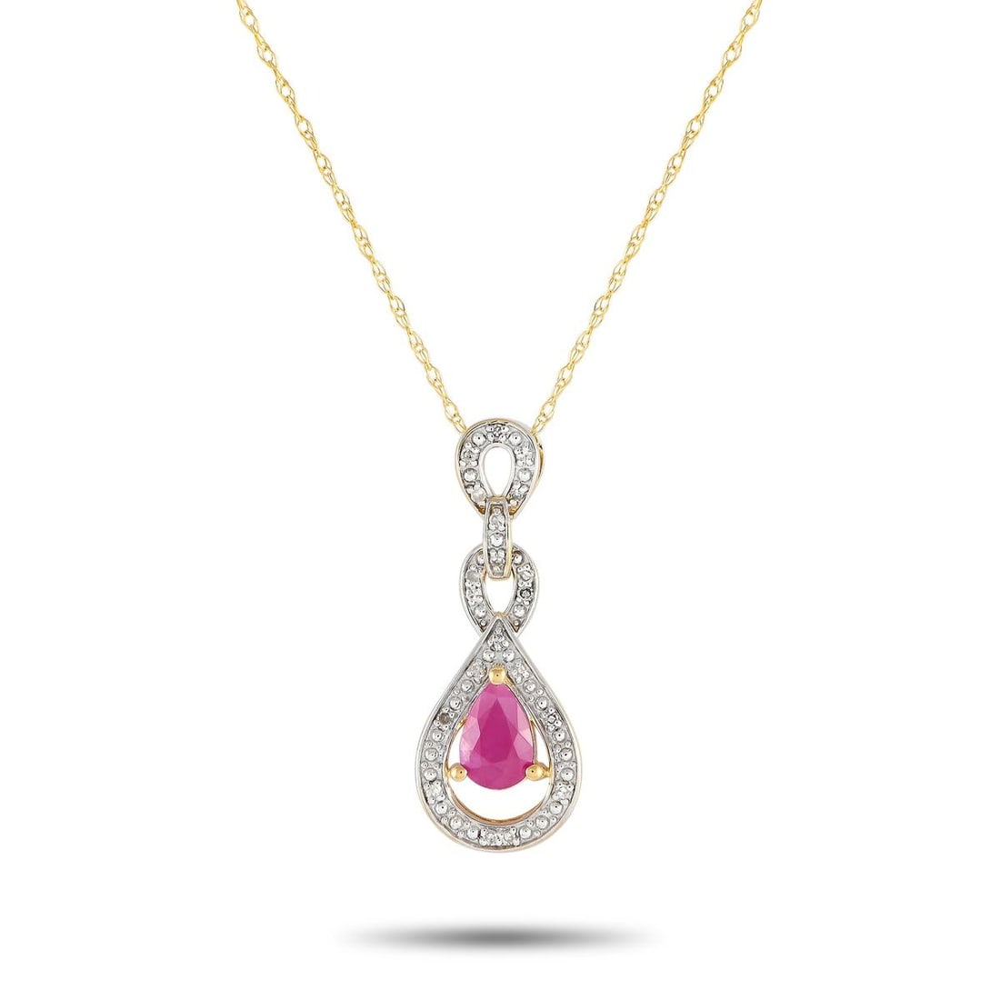 14K YELLOW GOLD 0.08CT DIAMOND AND RUBY NECKLACE: An intricate pendant measuring 0.85 long and 0.45 wide is suspended from an 18 chain on this elegant 14K yellow gold necklace. Ideal for any occasion, it comes complete with a captivating Ruby center 