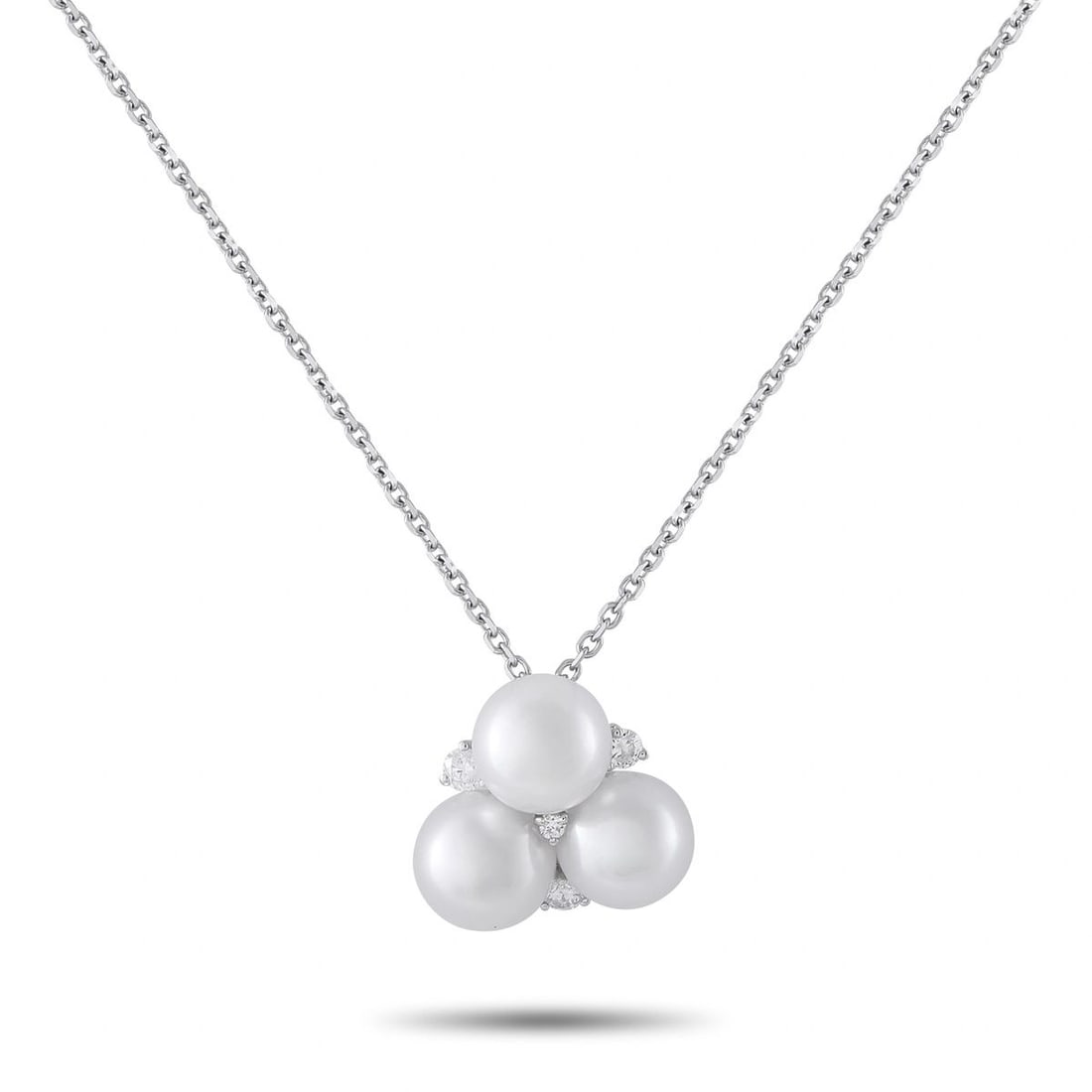 ASSAEL 18K WHITE GOLD 0.22CT DIAMOND AND PEARL NECKLACE: This Assael necklace is crafted in 18K white gold and features a cluster of three lustrous 8mm cultured pearls accented by round diamonds totaling approximately 0.22 carats. The pendant hangs from a 2