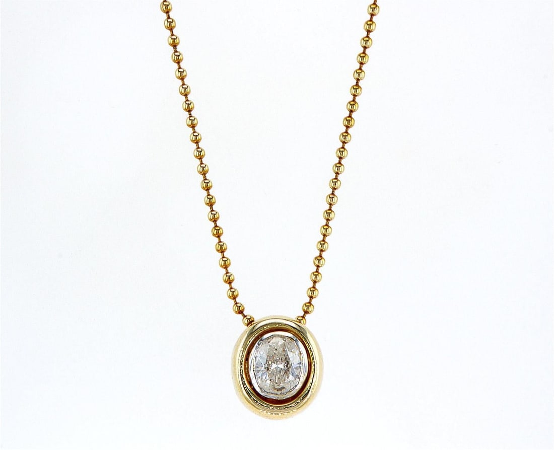 14kt Yellow Gold 0.63ctw Diamond Pendant: One 14k yellow gold pendant with chain (585 stamped), set with one center natural diamond. Jewelry Weight: Grs Total Diamonds Weight: 0.63Cts Main Stones Description: Quantity: 1 Cut and shape: Oval C