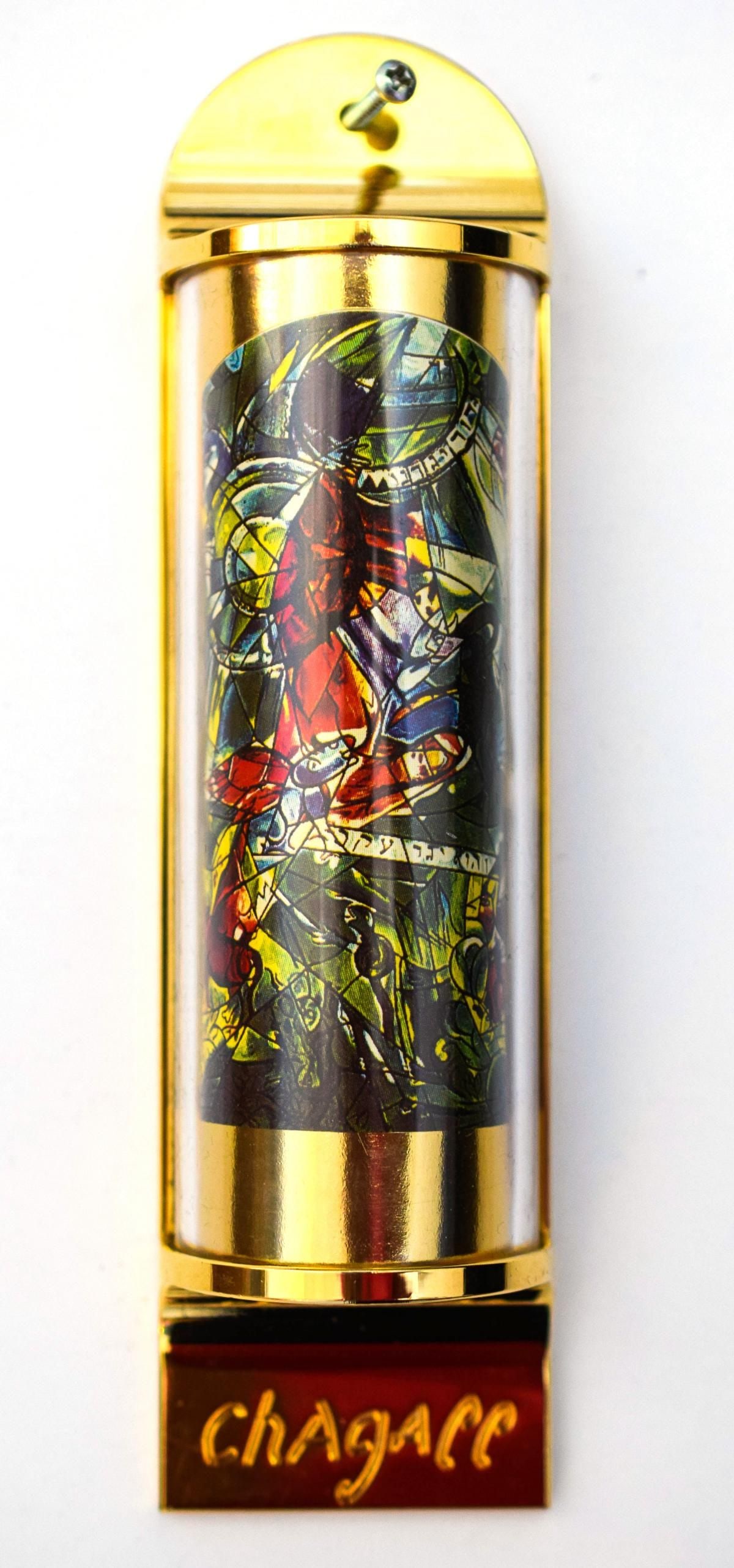 Marc Chagall- Mezuzah - silkscreen on 24K gold plated bronze "12 Tribes Hadassah Windows - Gad": Artist: Marc Chagall. Medium: Mezuzah - silkscreen on 24K gold plated bronze. Title: 12 Tribes Hadassah Windows - Gad. Size: 5" x 1.5". Reference#: 15778.