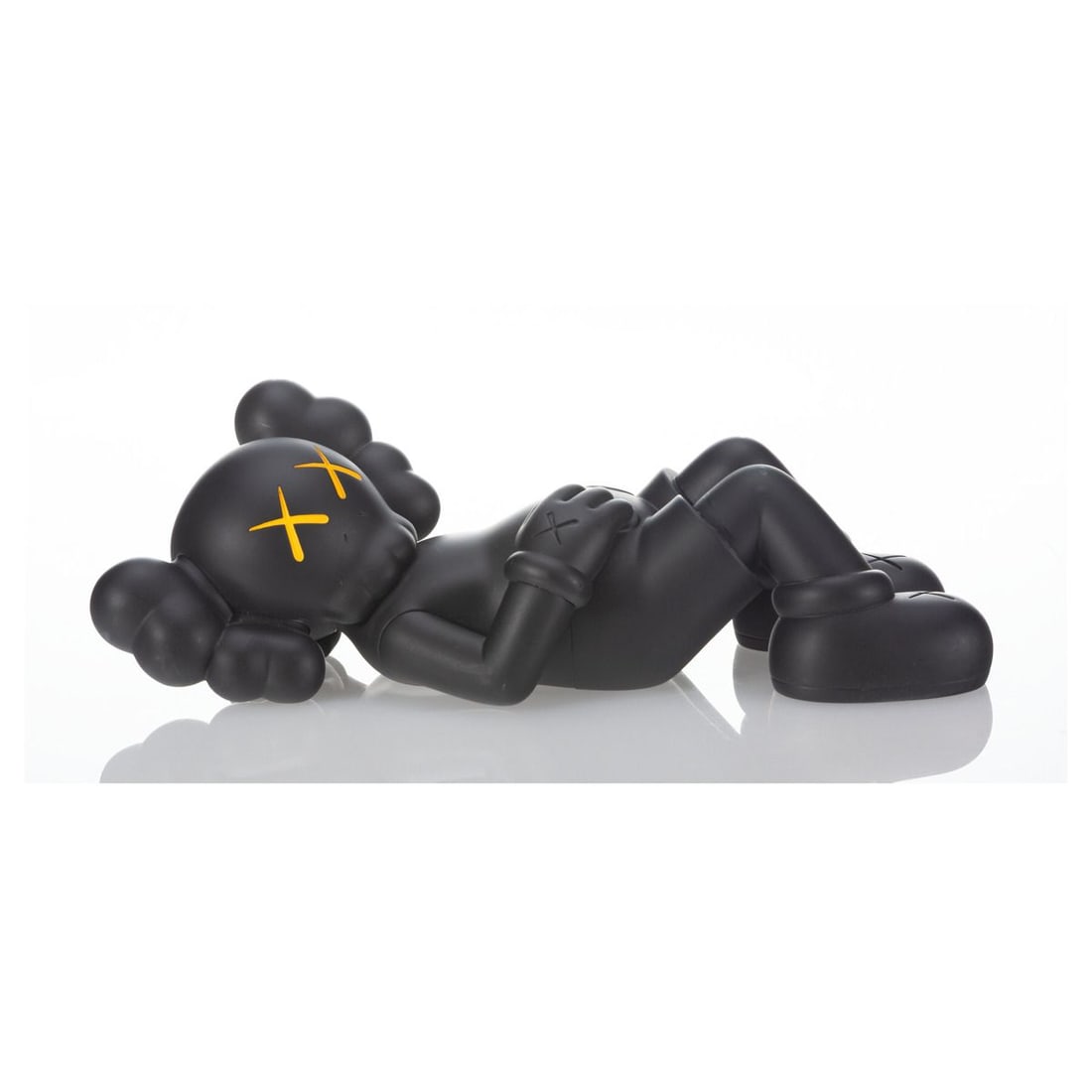 KAWS (b. 1974)- Painted cast vinyl "Holiday: Japan": Artist: KAWS (b. 1974). Medium: Painted cast vinyl. Title: Holiday: Japan. Size: 9.5" x 4". Signature: Stamped on underside. Certificate of Authenticity: Is included. Additional: Produced by AllRights