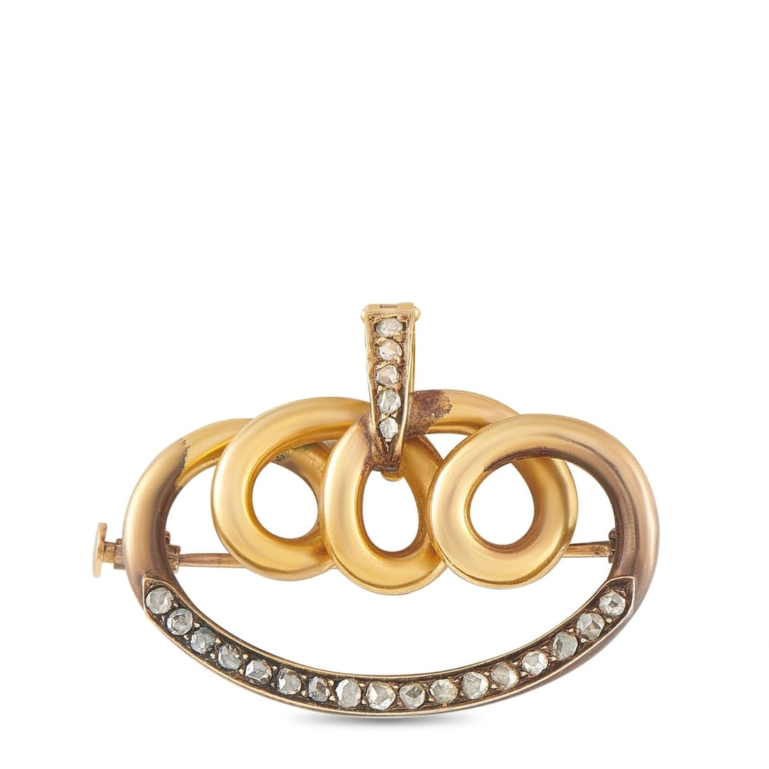 ANTIQUE VICTORIAN 18K YELLOW GOLD ROSE-CUT DIAMOND SCROLL BROOCH: This antique brooch is crafted in 18K yellow gold, designed as a scrolling loop motif set within an oval border of rose cut diamonds. The brooch measures approximately 1.44 x 1.19 inches and weighs 9.
