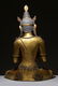 LARGE GILT BRONZE SEATED FIGURE - 9
