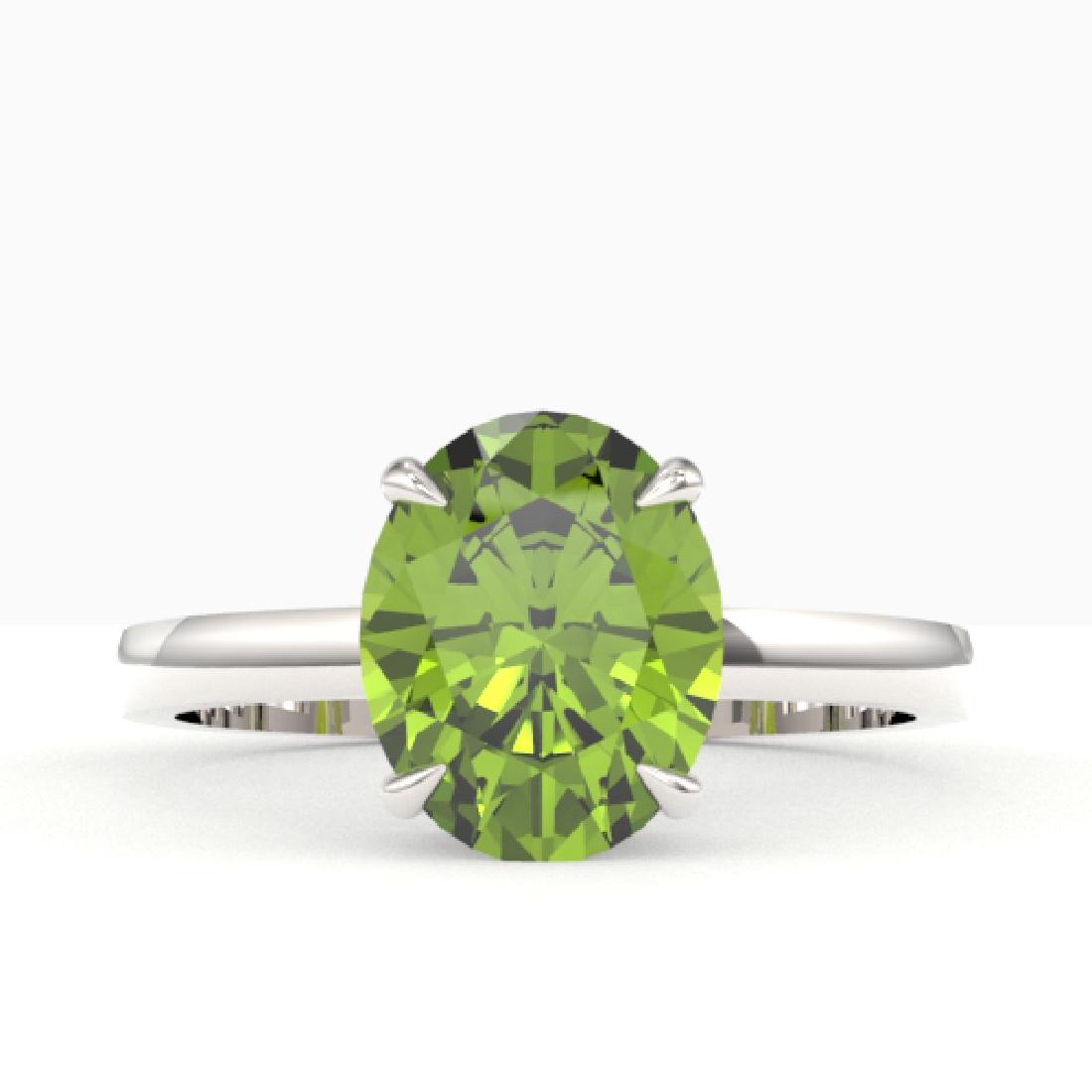 2.75 CTW Peridot Designer Inspired Solitaire Ring 18K: REF-38N8Y -22073 ---- 2.75 CTW Peridot Designer Inspired Solitaire Ring 18K White Gold ---- Luxury Designer Brand Ring Appraised at $2,750 Certificate Number US22073 18k White gold, Ring Size is 7, Ri