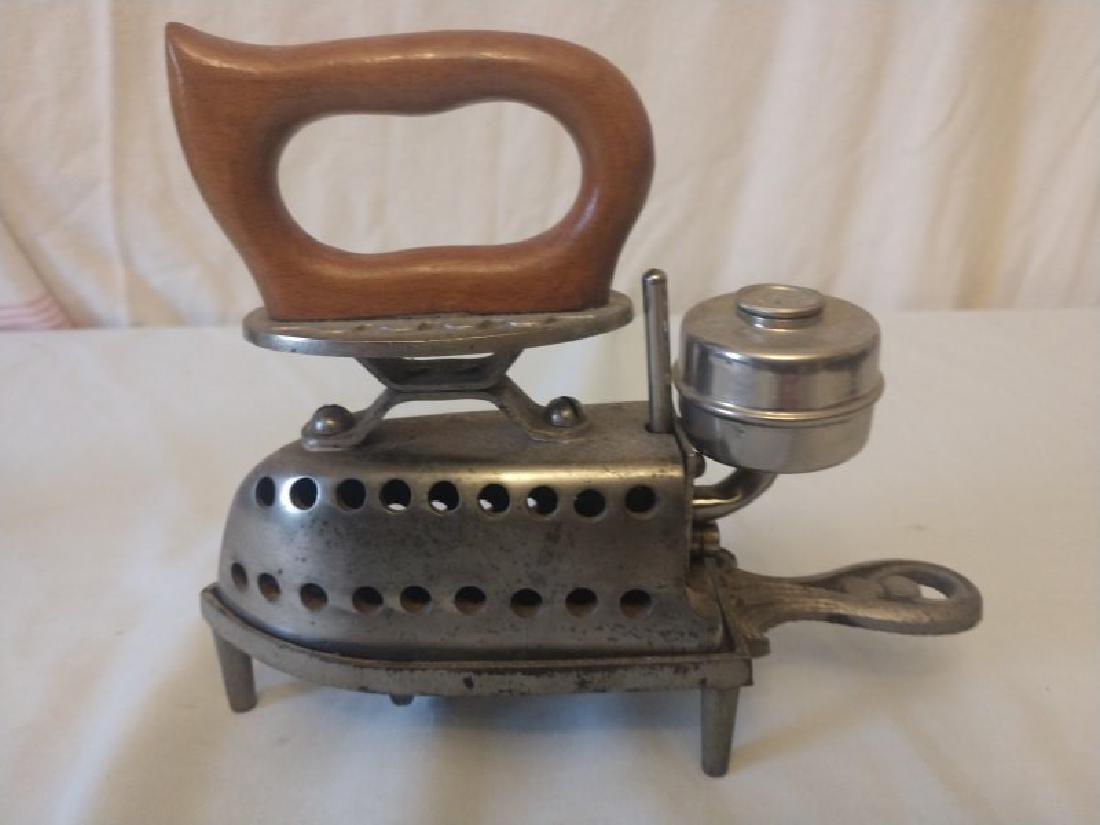 Iron - Alcohol Powered Travel Iron & Trivet: Alcohol Powered Travel Iron And Trivet, CK Brand With A Fish. 8 1/2" L X 2 3/4" W X 7 1/4" H