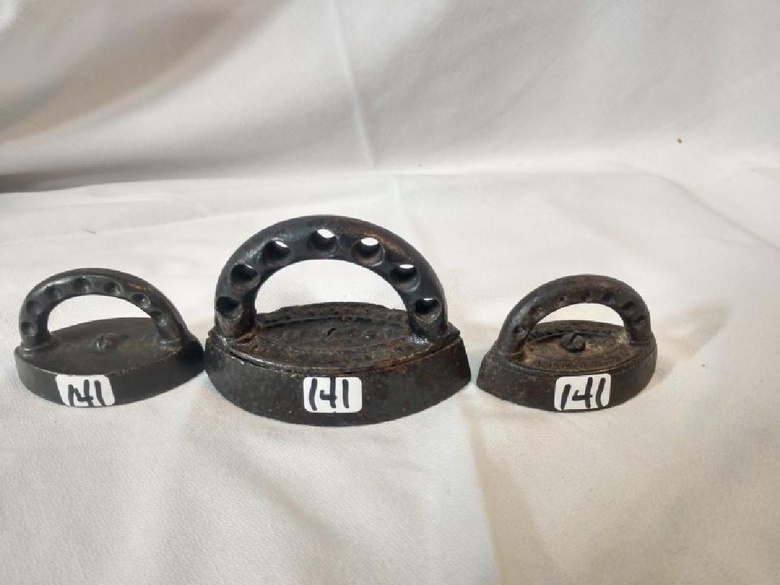 Iron - Irons (3): (1) Little Enterprise Iron, (2) Enterprise star in Center iron and (3) Litter iron no name. Measures 2 5/8"L - 3 3/4"L x 1 1/2"W - 2"W x 1 3/4"H - 2 3/4"H